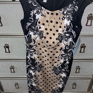 Never worn black& tan dress w/ Snatched waist and floral details .